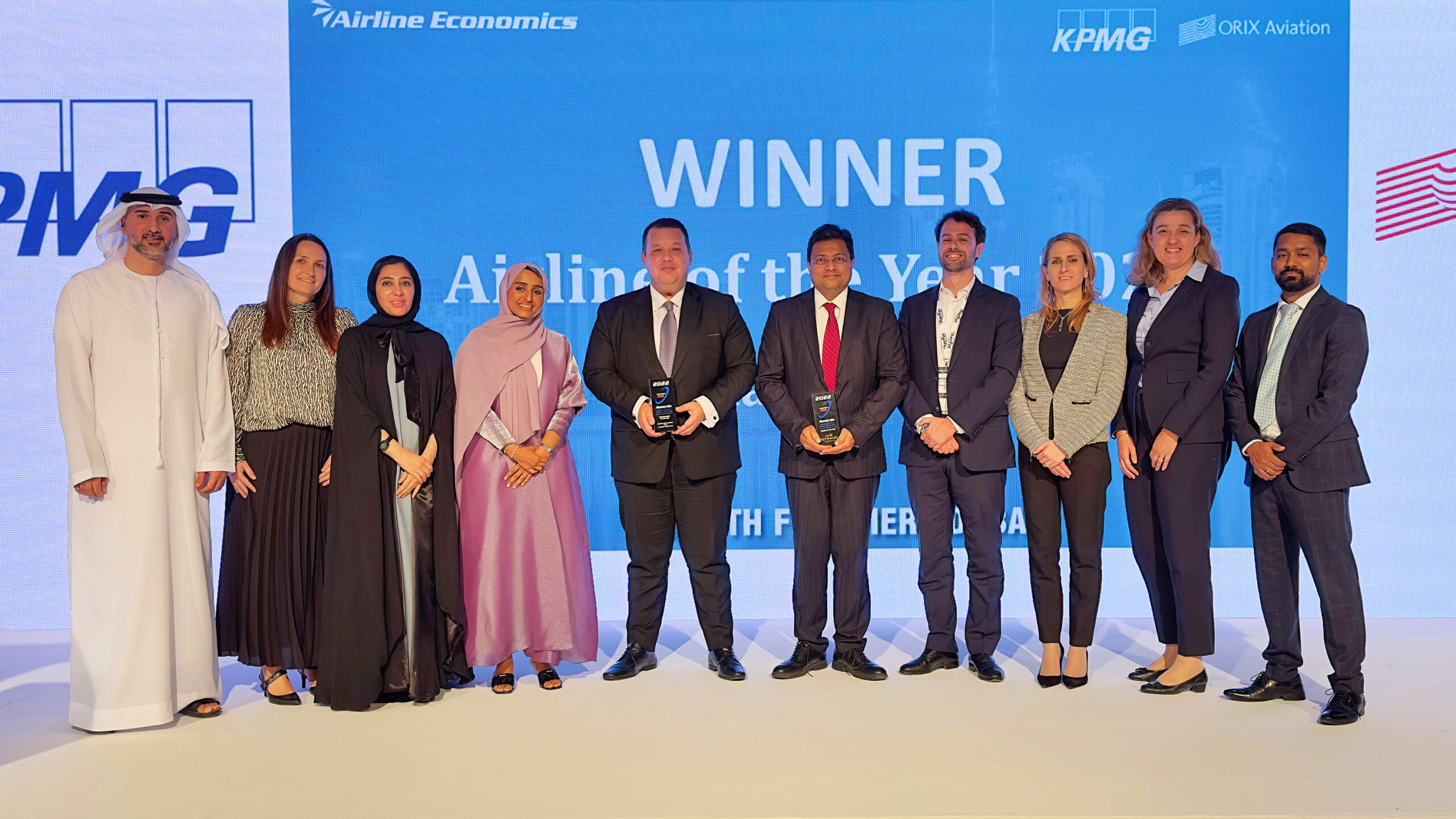 Adam Boukadida, CFO, and the Etihad team celebrate the airline's awards